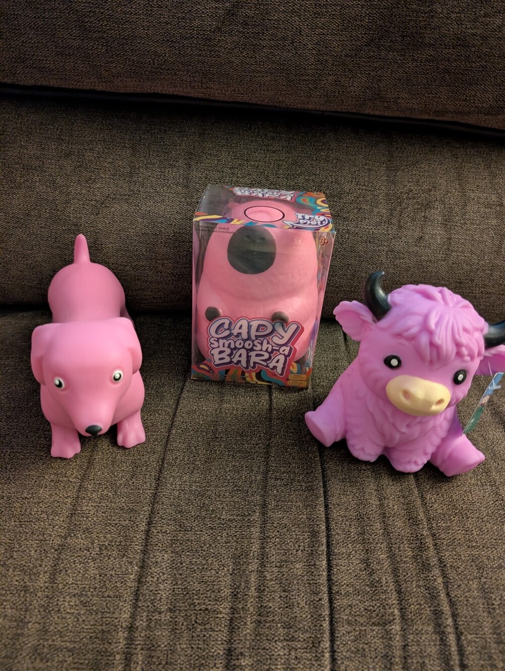 Squeezy Dachshund, Highland Cow And Happy Smosh-a-Bara Squishies.